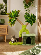 Chat installé sur l’arbre à chat manguier Mangoria dans un salon lumineux d’inspiration végétale.